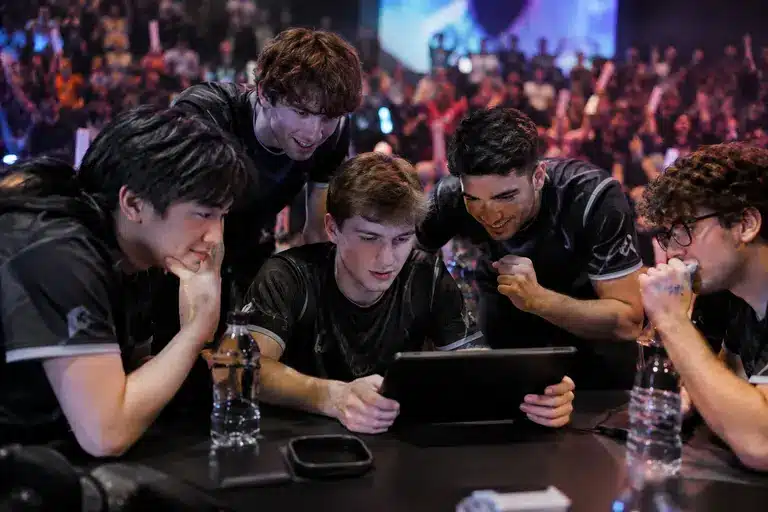 Tournament desk with headsets and monitors before a Rainbow Six match